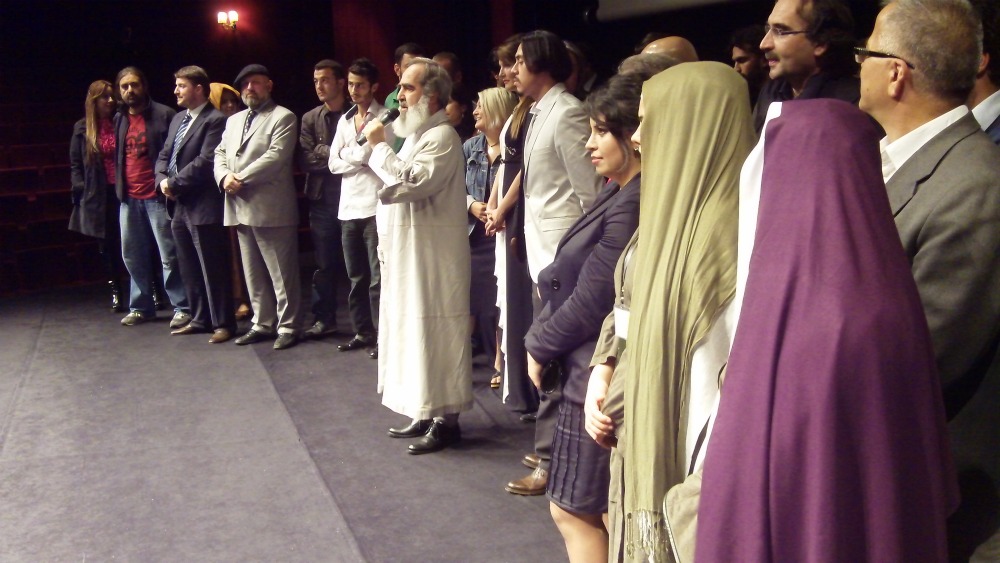 Hasim Akten (center) with crew at premiere
